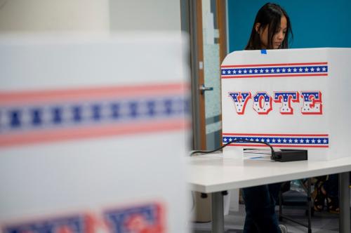 A woman votes on the second day of early voting in Wisconsin at the Milwaukee Area Technical College in Milwaukee, Wisconsin, U.S. October 23, 2024.