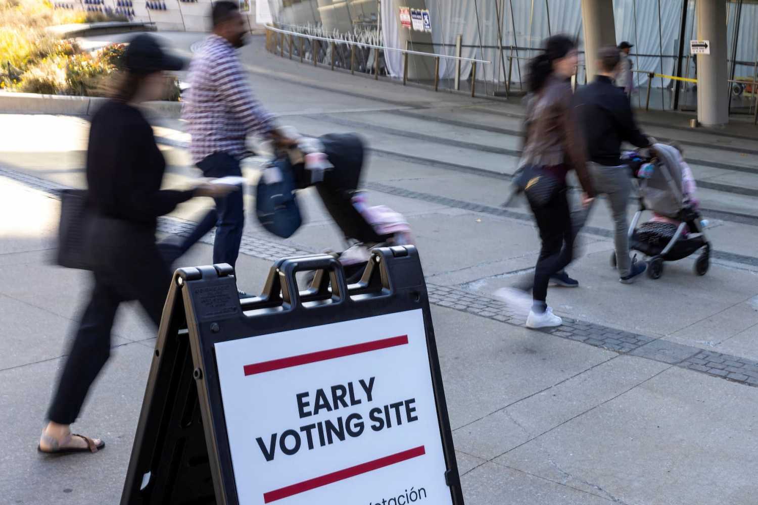 Voters arrive at a polling station during early voting at the Brooklyn Museum in Brooklyn, New York City, U.S., October 26, 2024.