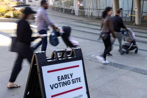 Voters arrive at a polling station during early voting at the Brooklyn Museum in Brooklyn, New York City, U.S., October 26, 2024.