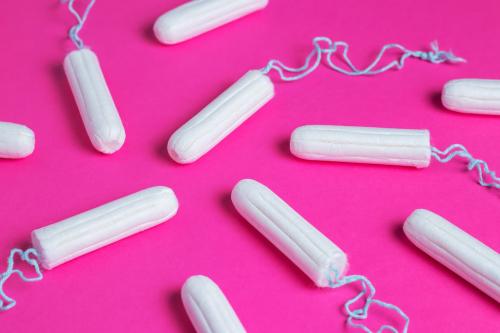 Tampons scattered across a pink background. Skrypnykov Dmytro/Shutterstock