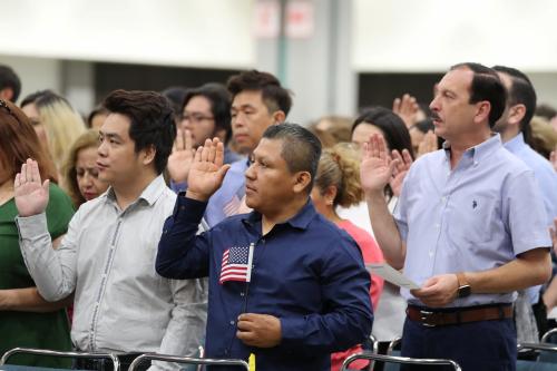 Immigrants are sworn in as new U.S. citizens at a naturalization ceremony in Los Angeles, California, U.S., August 22, 2019.