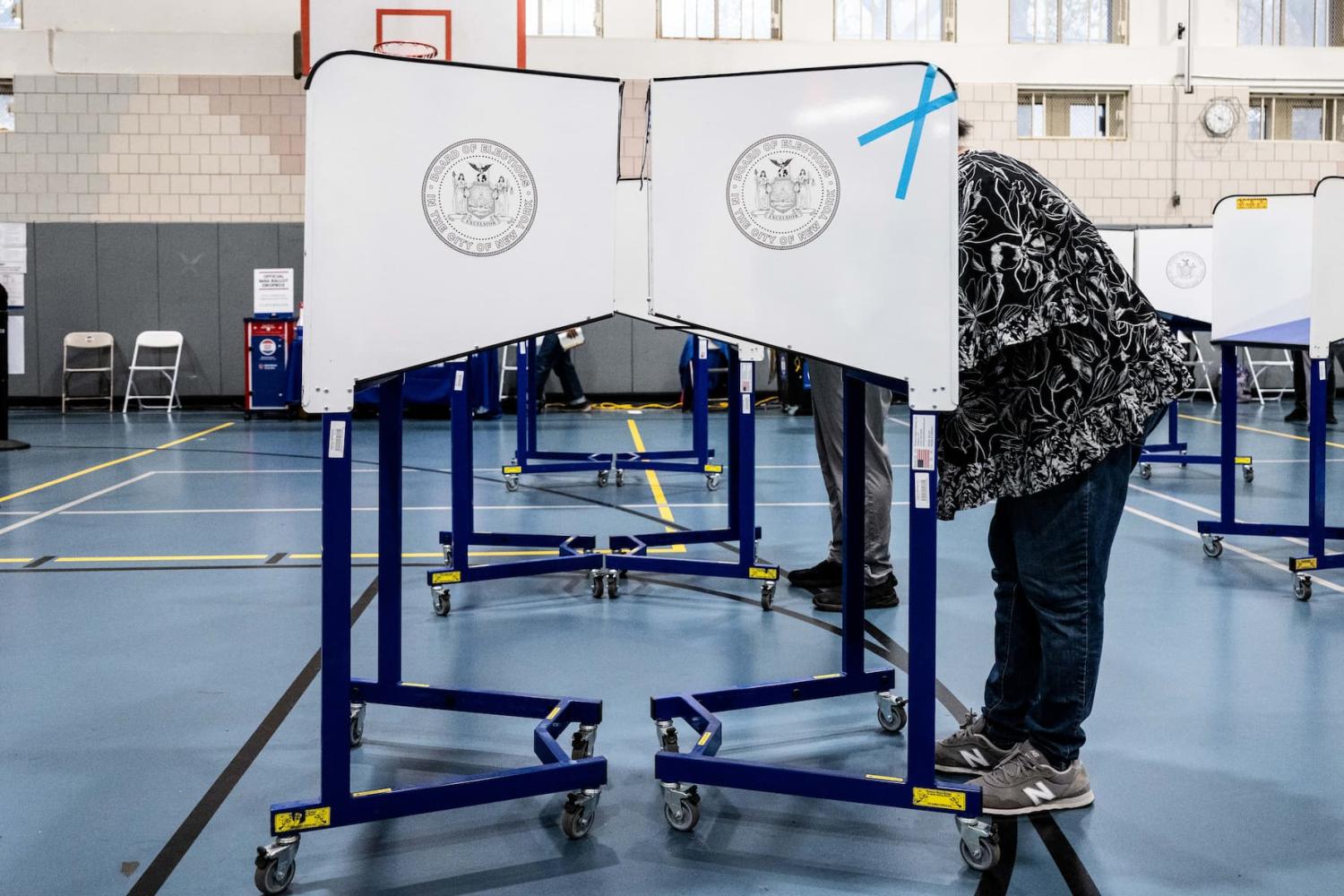 Privacy booths at a polling place during early voting at West Side High School in New York City.