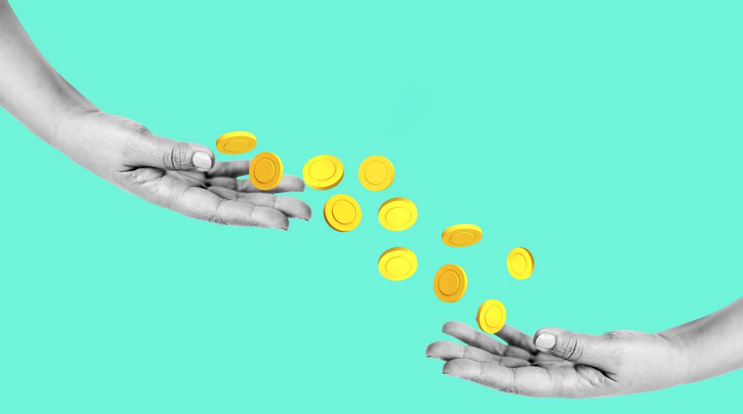 Coins transfer between two outstretched hands