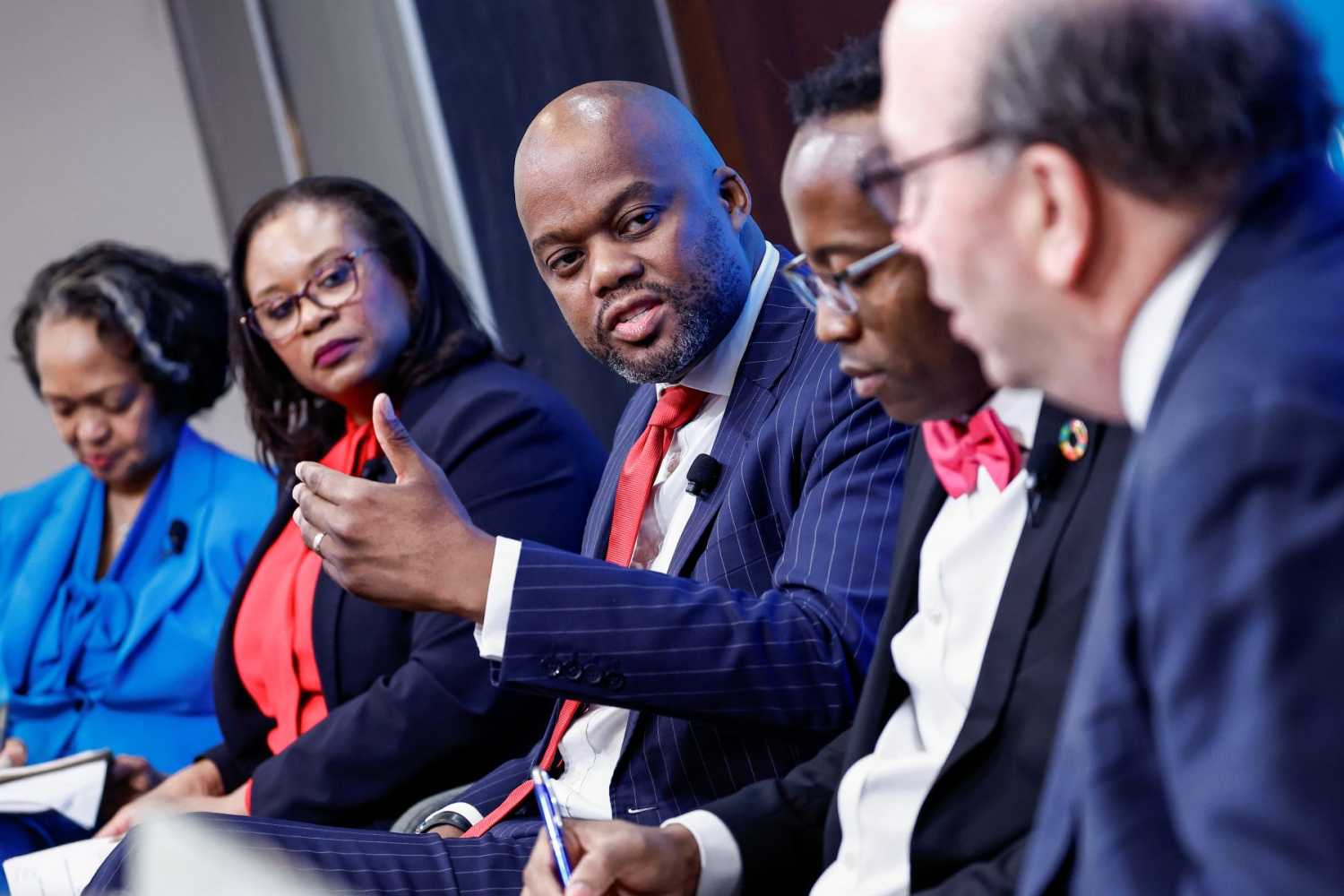 Wamkele Mene and panelists