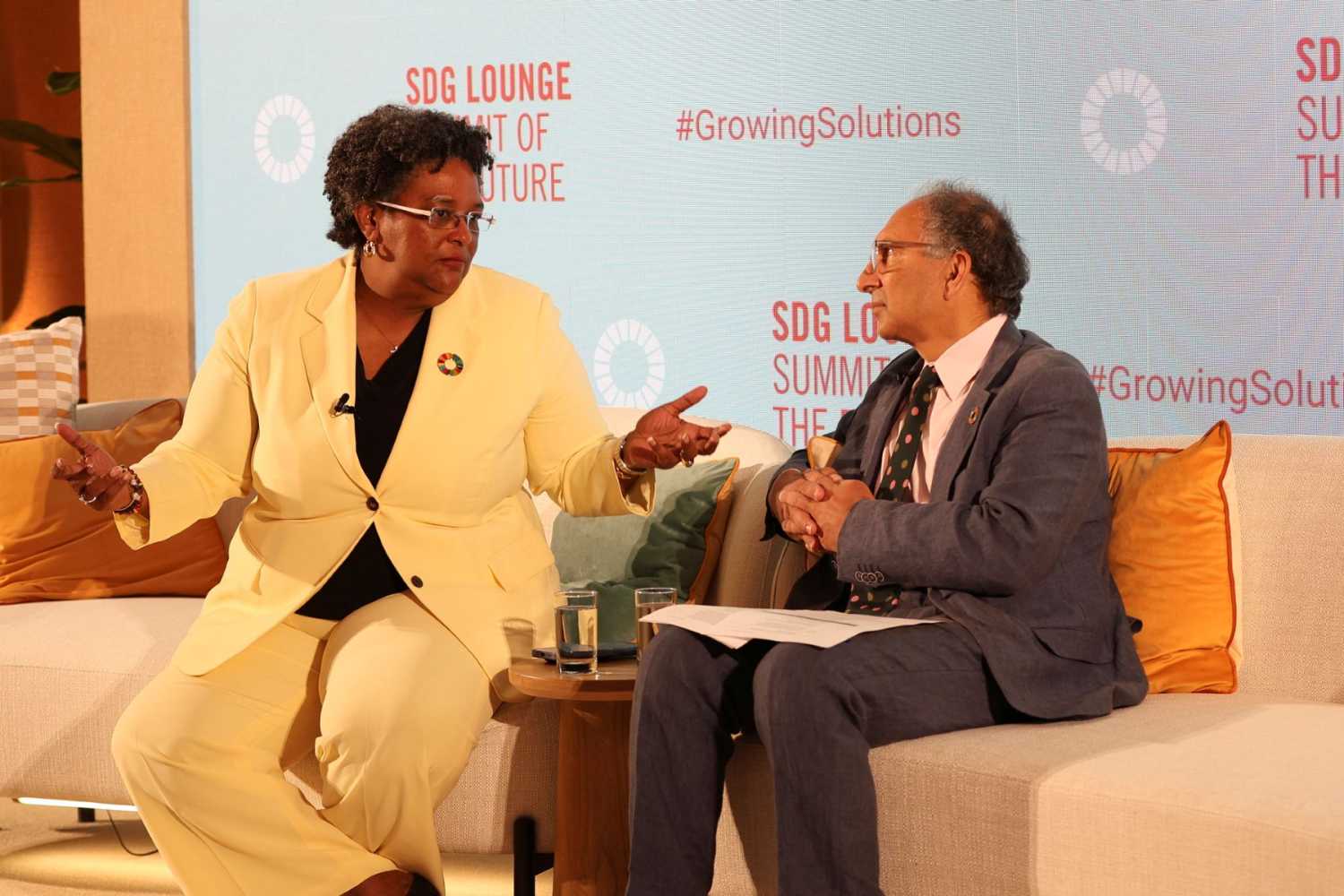 Mia Mottley and Homi Kharas sit in conversation