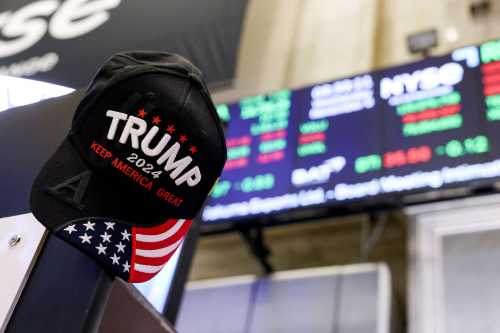 A hat reading "Trump 2024" hangs in front of a stock ticker