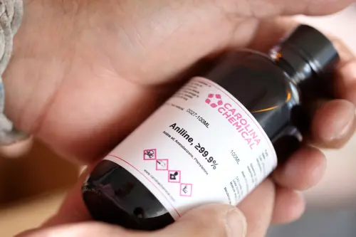 Journalist Maurice Tamman unboxes fentanyl precursors at Reuters' office in New York City, U.S., June 18, 2024.