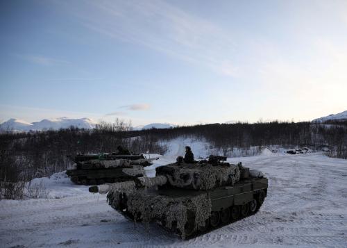 A soldier from the Second Tank Squadron of the First Battalion of the Northern Brigade of the Norwegian Army looks out from the top of a tank during "Reindeer 2", a Norwegian-U.S. military drill in Setermoen, Norway, October 30, 2019.