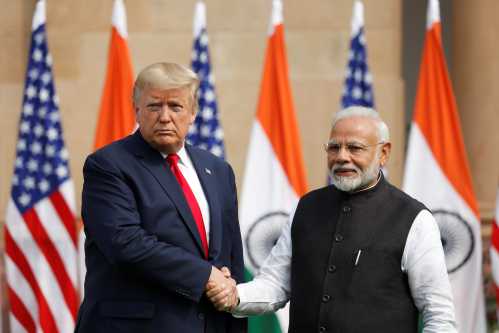 U.S. President Donald Trump shakes hands with Indian Prime Minister Narendra Modi at Hyderabad House in New Delhi, India, February 25, 2020.