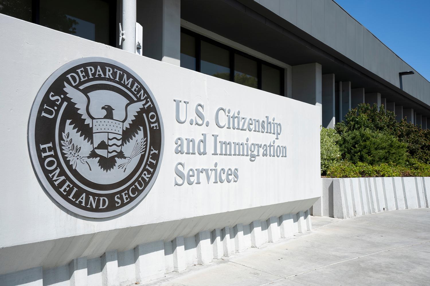 Santa Clara, CA, USA - Apr 30, 2022: Closeup of the U.S. Citizenship and Immigration Services (USCIS) sign seen outside of the USCIS San Jose Field Office in Santa Clara, California.
