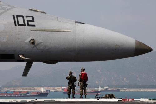 U.S. Marines stand on the deck of U.S. aircraft carrier USS George Washington upon its arrival in Hong Kong October 29, 2009.