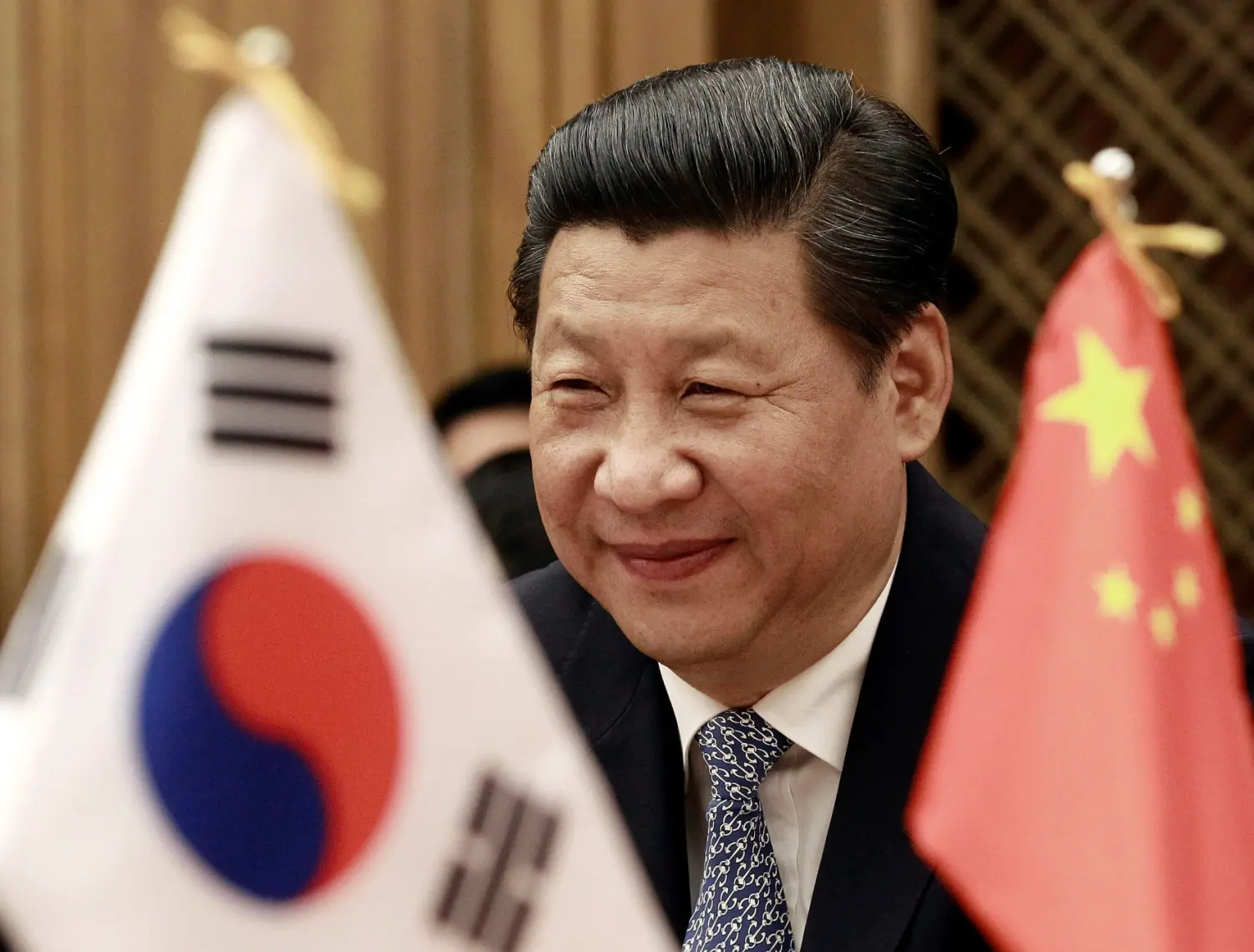 Chinese President Xi Jinping smiles during a meeting with South Korean National Assembly speaker Chung Ui-hwa at the National Assembly in Seoul July 4, 2014.