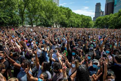 People participate in a peaceful memorial for George Floyd at Cadman Plaza Park in Brooklyn, New York, NY on June 4, 2020.
