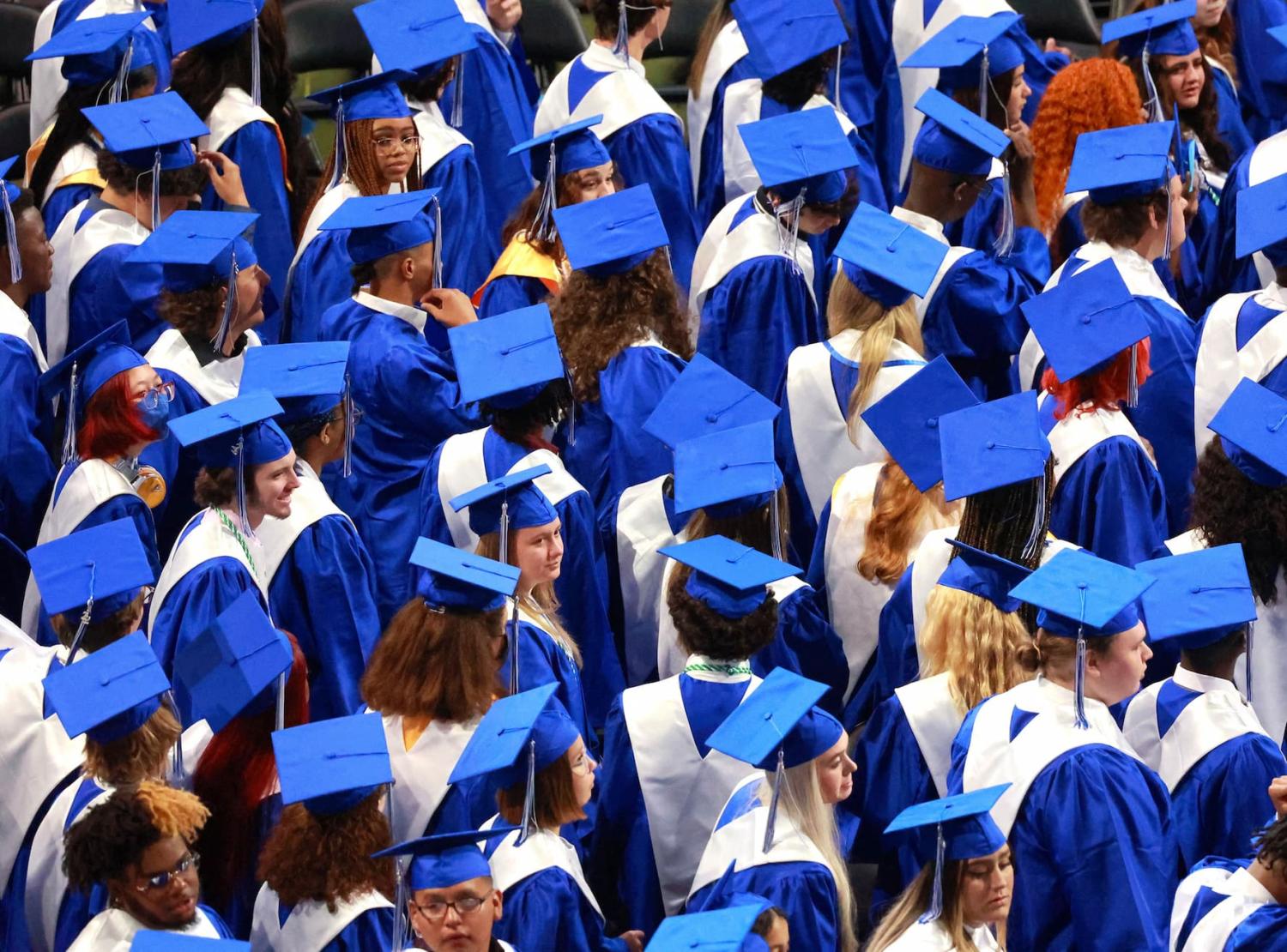Seniors from Apopka High School line up at the start of their graduation commencement ceremony at Amway Center on May 26, 2022, in Orlando, Florida.