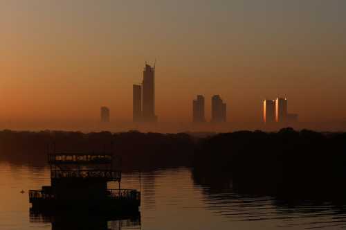 A view of buildings in morning fog as the first sun of the New Year rises in Karachi, Pakistan, January 1, 2023.