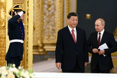 Russian President Vladimir Putin and Chinese President Xi Jinping arrive for Russia-China talks in an expanded format at the Kremlin in Moscow, Russia March 21, 2023.