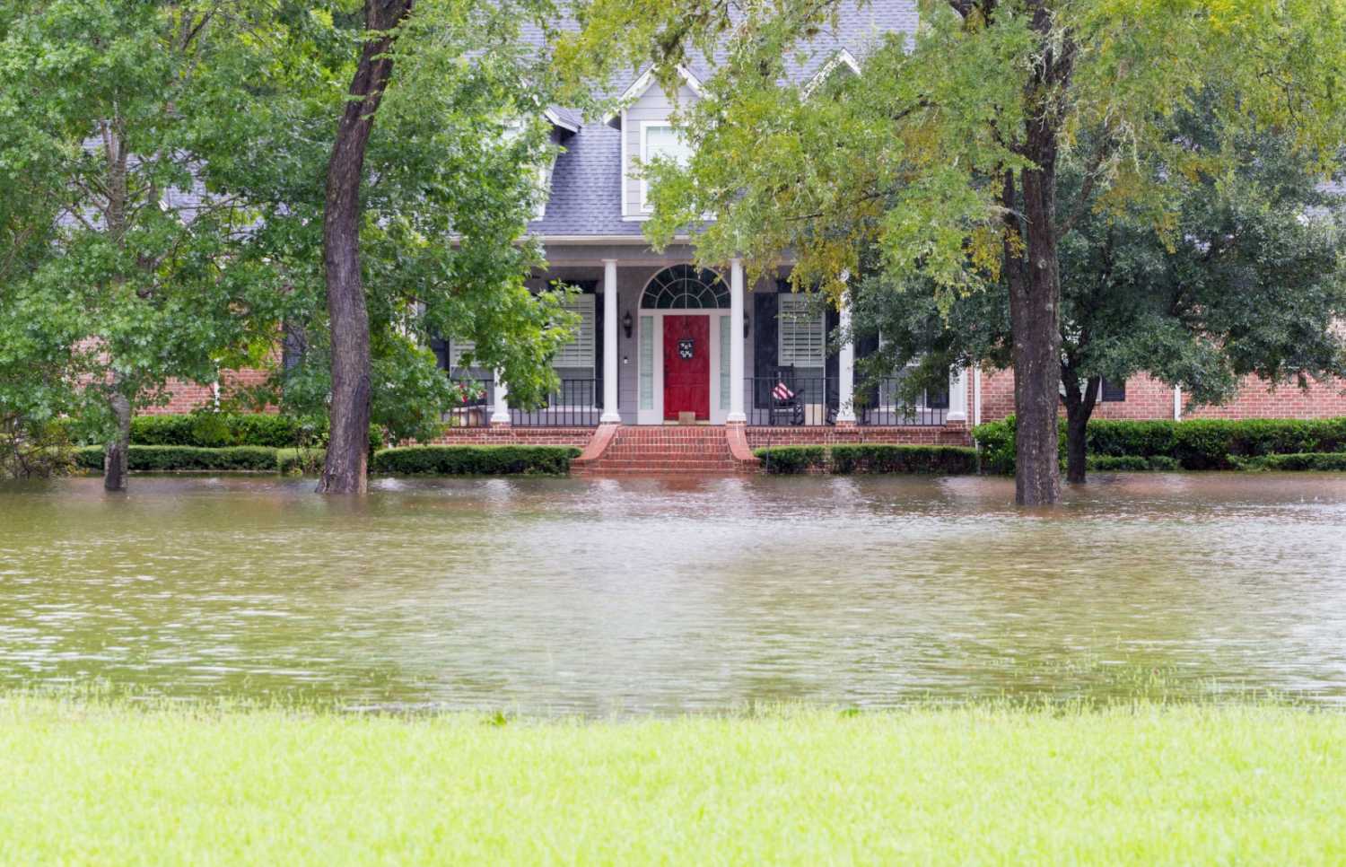 High water and flooded house in Houston suburbs during Hurricane Harvey