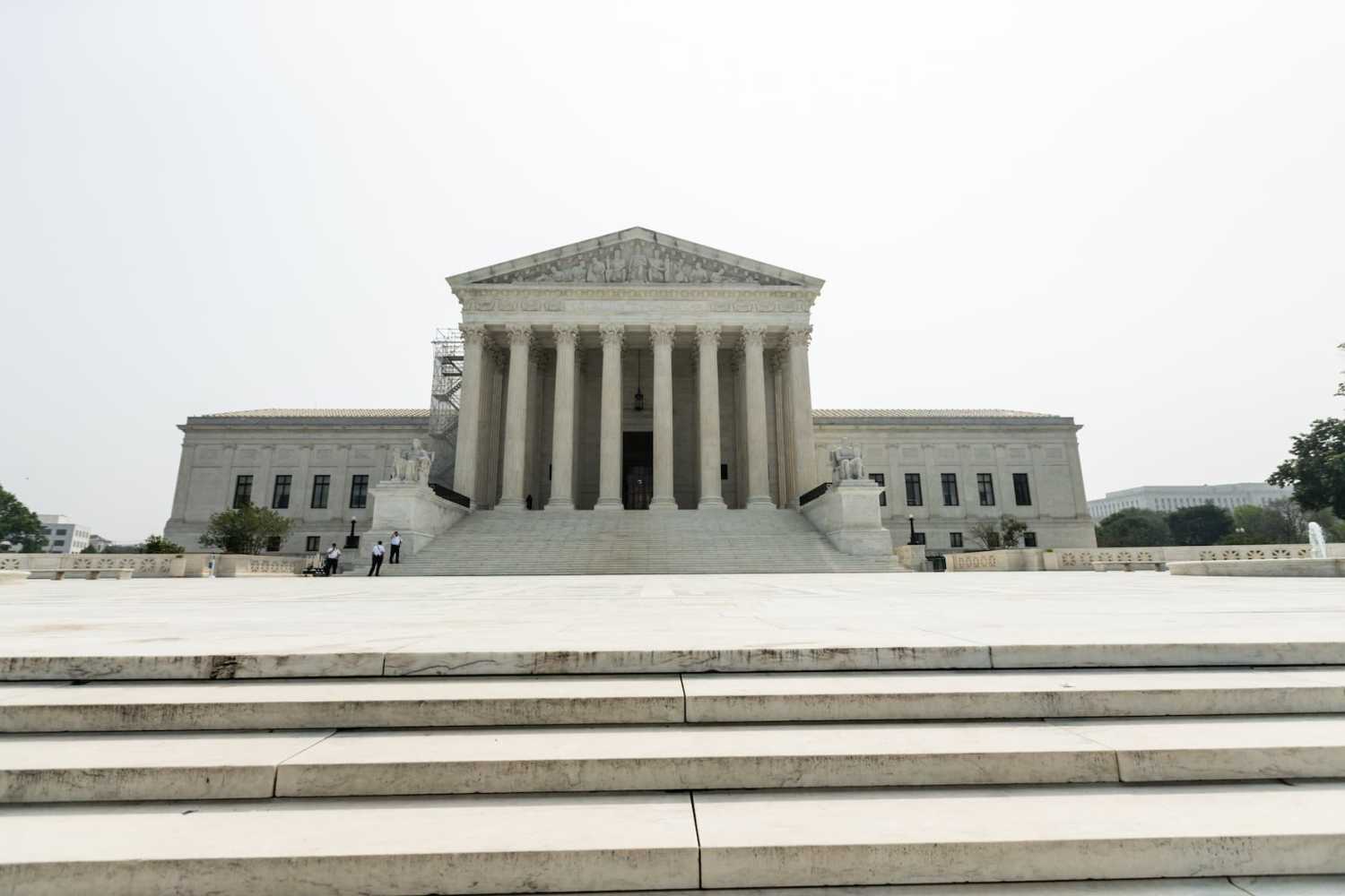 U.S. Supreme Court Police stand in front of the building shortly after the Court’s ruling that universities may not consider race in admissions, effectively ending affirmative action.
