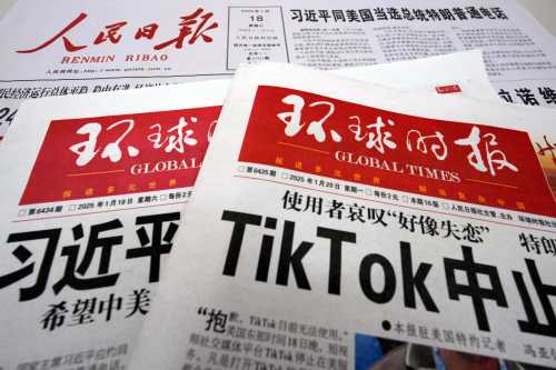 Major Communist Party newspapers in China report on its front page articles related to U.S.-China relations, including the telephone talks between Chinese President Xi Jinping and U.S. President-elect Trump, and the temporary suspension of TikTok services in the U.S., in Beijing, China, January 20, 2025.