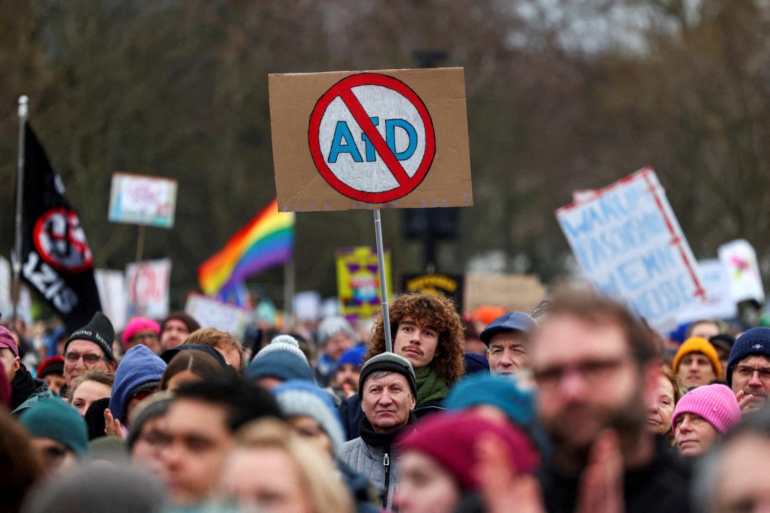 People attend a protest against the migration plans of the CDU party leader and top candidate for chancellor, Friedrich Merz and the far-right Alternative for Germany party (AfD) in Berlin, Germany February 2, 2025.