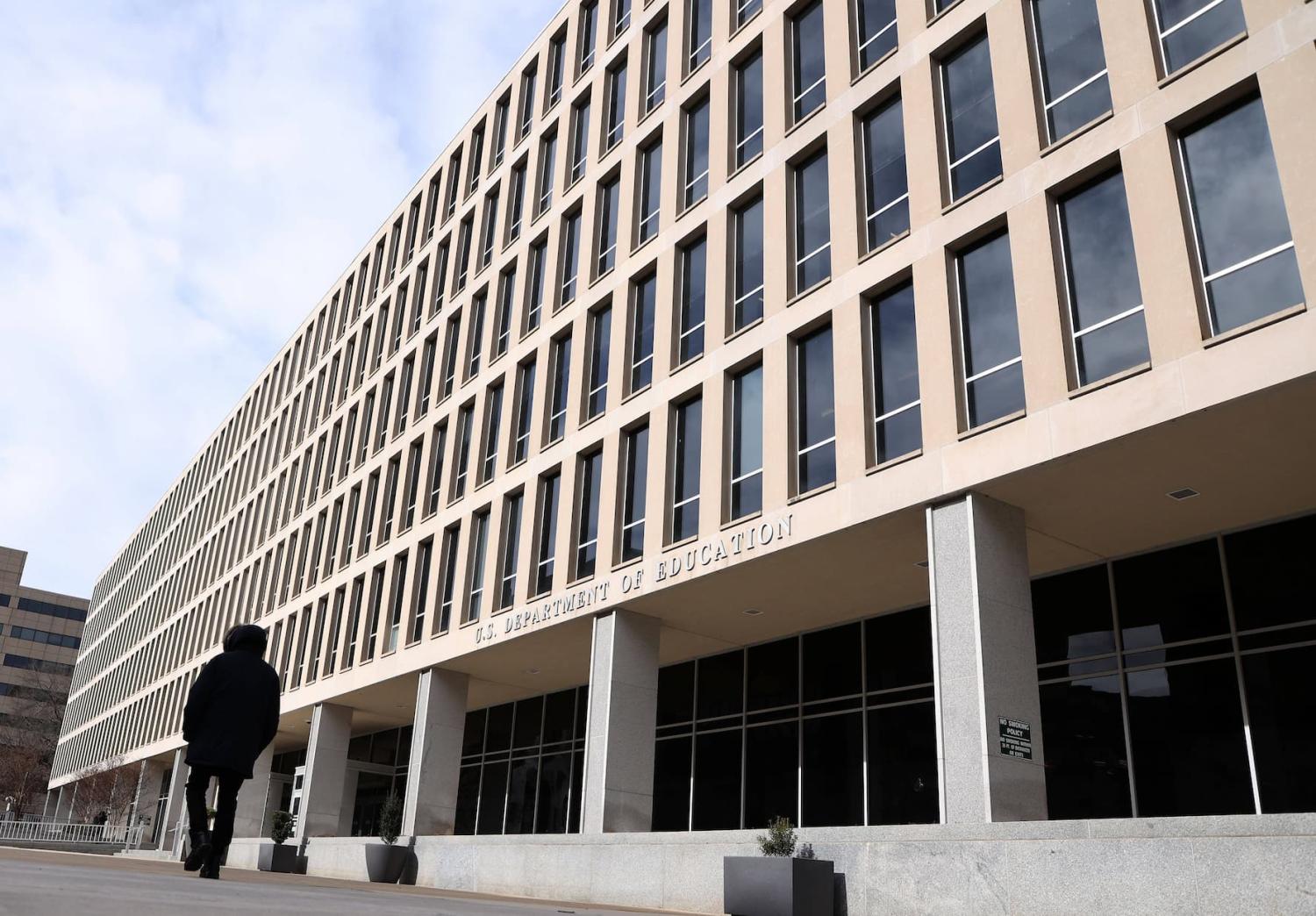 A man walks past to the Lyndon Baines Johnson Department of Education Building on February 7, 2025 in Washington, DC. U.S.