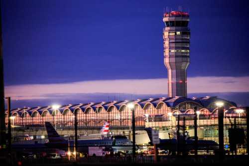 The air traffic control tower and some American Airlines planes are pictured at the Ronald Reagan Washington National Airport, in the aftermath of the collision of American Eagle flight 5342 and a Black Hawk helicopter that crashed into the Potomac River, in Washington, U.S., on February 2, 2025.