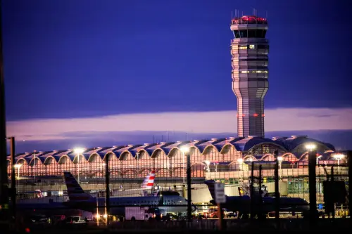 The air traffic control tower and some American Airlines planes are pictured at the Ronald Reagan Washington National Airport, in the aftermath of the collision of American Eagle flight 5342 and a Black Hawk helicopter that crashed into the Potomac River, in Washington, U.S., on February 2, 2025.