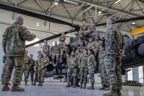 The command team of the 1-3rd Attack “Viper” Battalion address the women in the battalion during exercise Saber Strike 22 to celebrate Women’s history month at Lielvarde Air Base, March 15, 2022.
