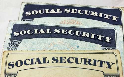 U.S. Social Security card designs over the past several decades are shown in this photo illustration taken on January 7, 2017. REUTERS/Hyungwon Kang