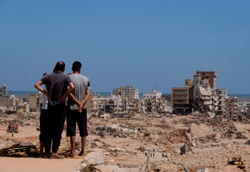 A view shows people looking at the damaged areas in the aftermath of the floods in Derna, Libya September 14, 2023.