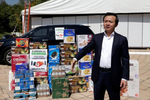China's ambassador to Mexico, Zhang Run, donates food for those affected by Hurricane Otis in Mexico City on October 25, 2023.