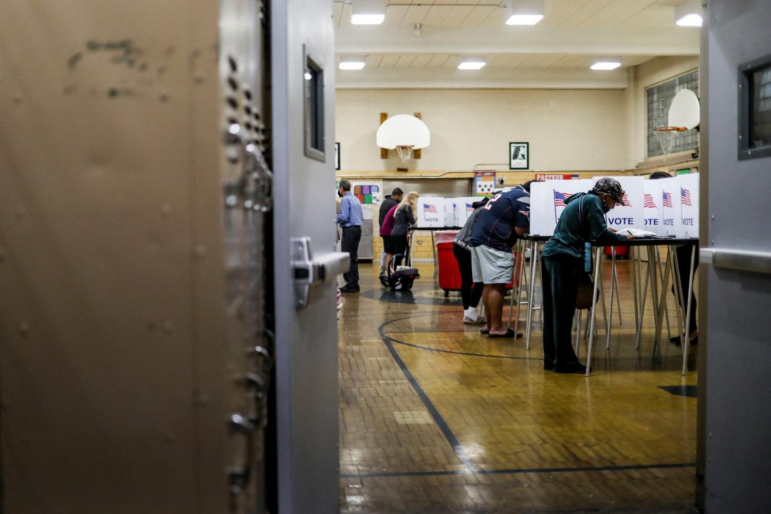 People vote in the 2024 U.S. presidential election on Election Day at Pasteur Elementary School in Detroit, Michigan, U.S., November 5, 2024.