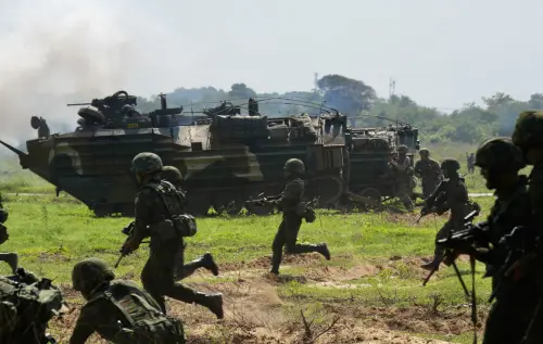 South Korea amphibious assault vehicles fire a smoke screen during the Cobra Gold 2025 joint military exercise at a military base in Sattahip, Chonburi, Thailand, on March 3, 2025. The Cobra Gold exercise is the largest joint multilateral military exercise in Southeast Asia, co-hosted annually in Thailand by the Royal Thai Armed Forces and the U.S. Indo-Pacific Command.