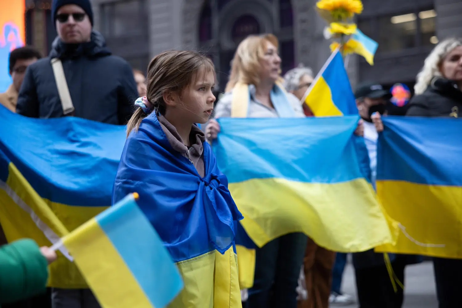Hundreds gather in Times Square, New York City, on March 9, 2025, for the Unite for Ukraine March. Protesters rally in support of a fair peace for Ukraine, partnership with the United States, human rights, and European and global security.