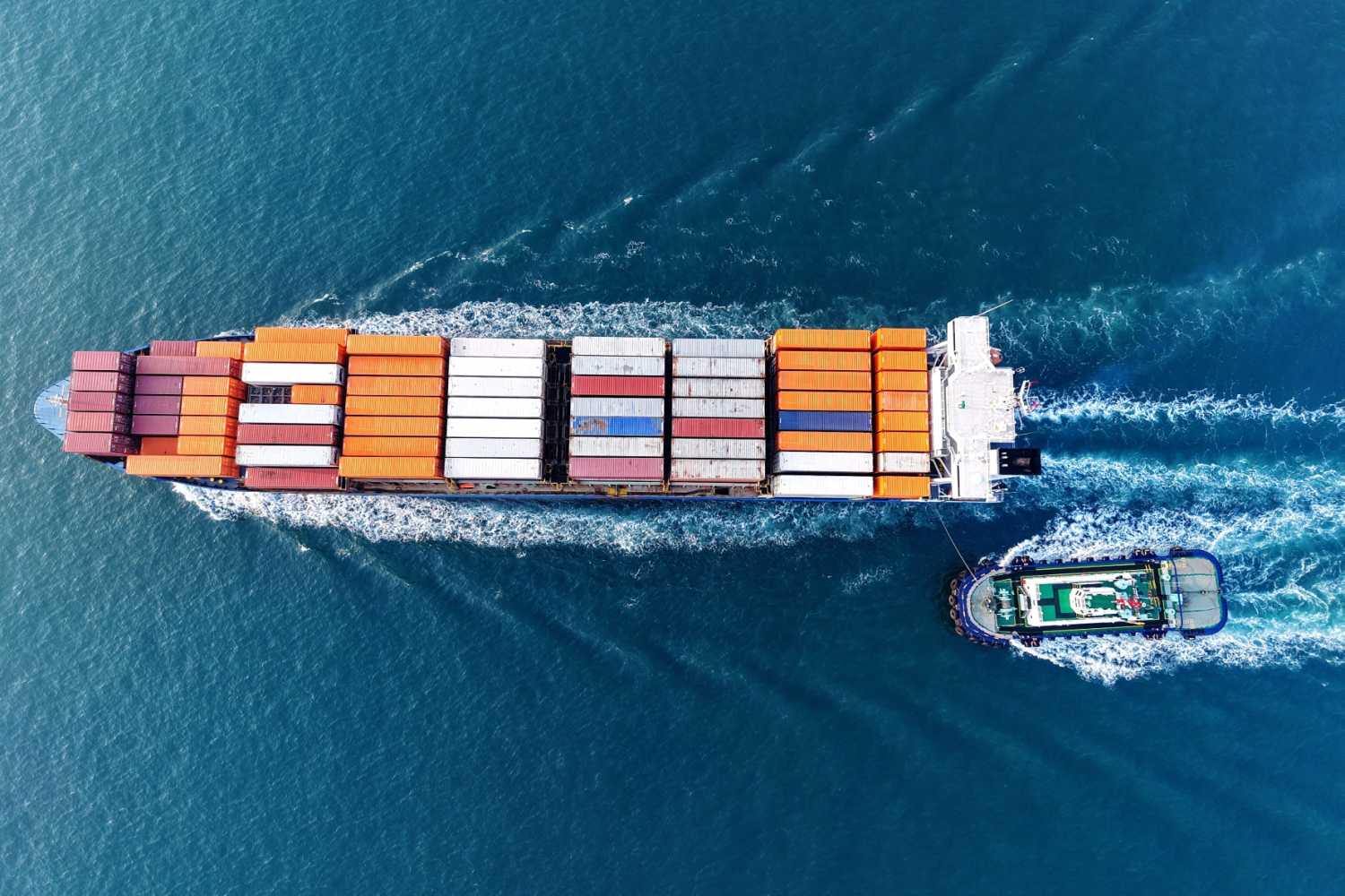 A cargo ship loaded with foreign trade containers enters and leaves the port of Qingdao, Shandong province, China on March 9, 2025.