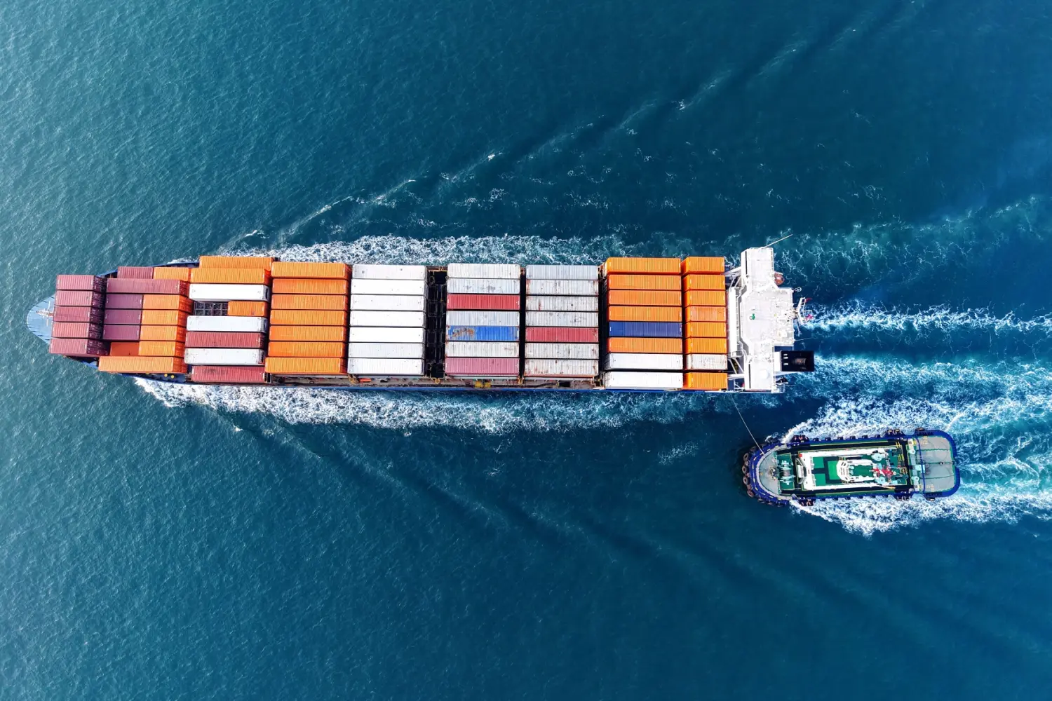 A cargo ship loaded with foreign trade containers enters and leaves the port of Qingdao, Shandong province, China on March 9, 2025.