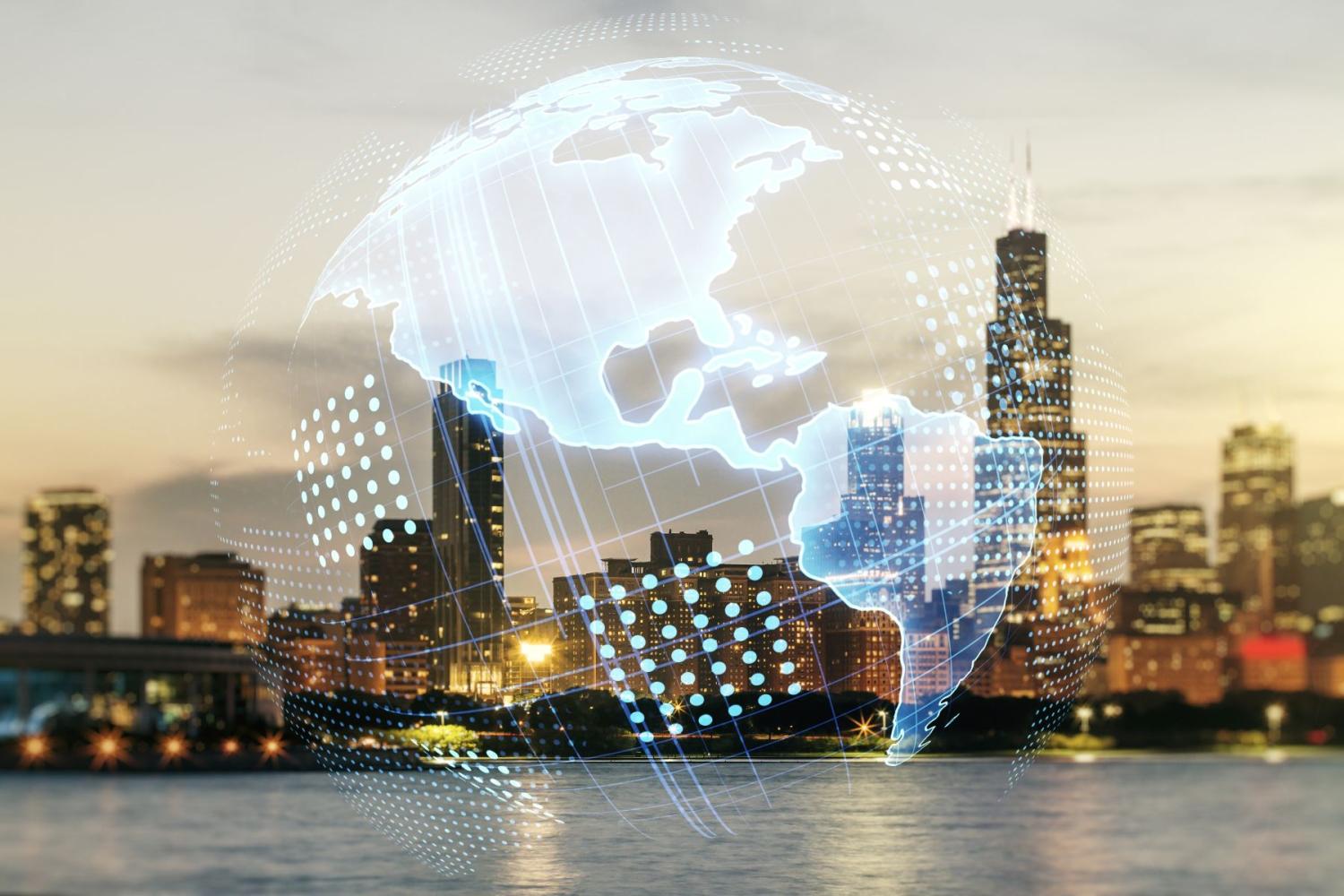 Virtual digital map of North America on Chicago skyline background