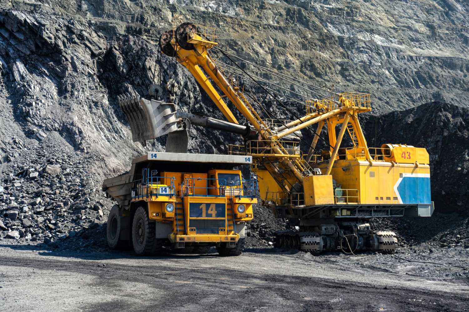 Heavy machinery operates in a quarry