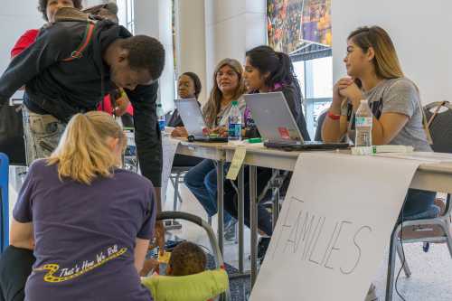Houston, Texas, August 30, 2017: Another shelter opens at NRG Center as refugees seek safety in Houston.Trained support workers check in new flood evacuees