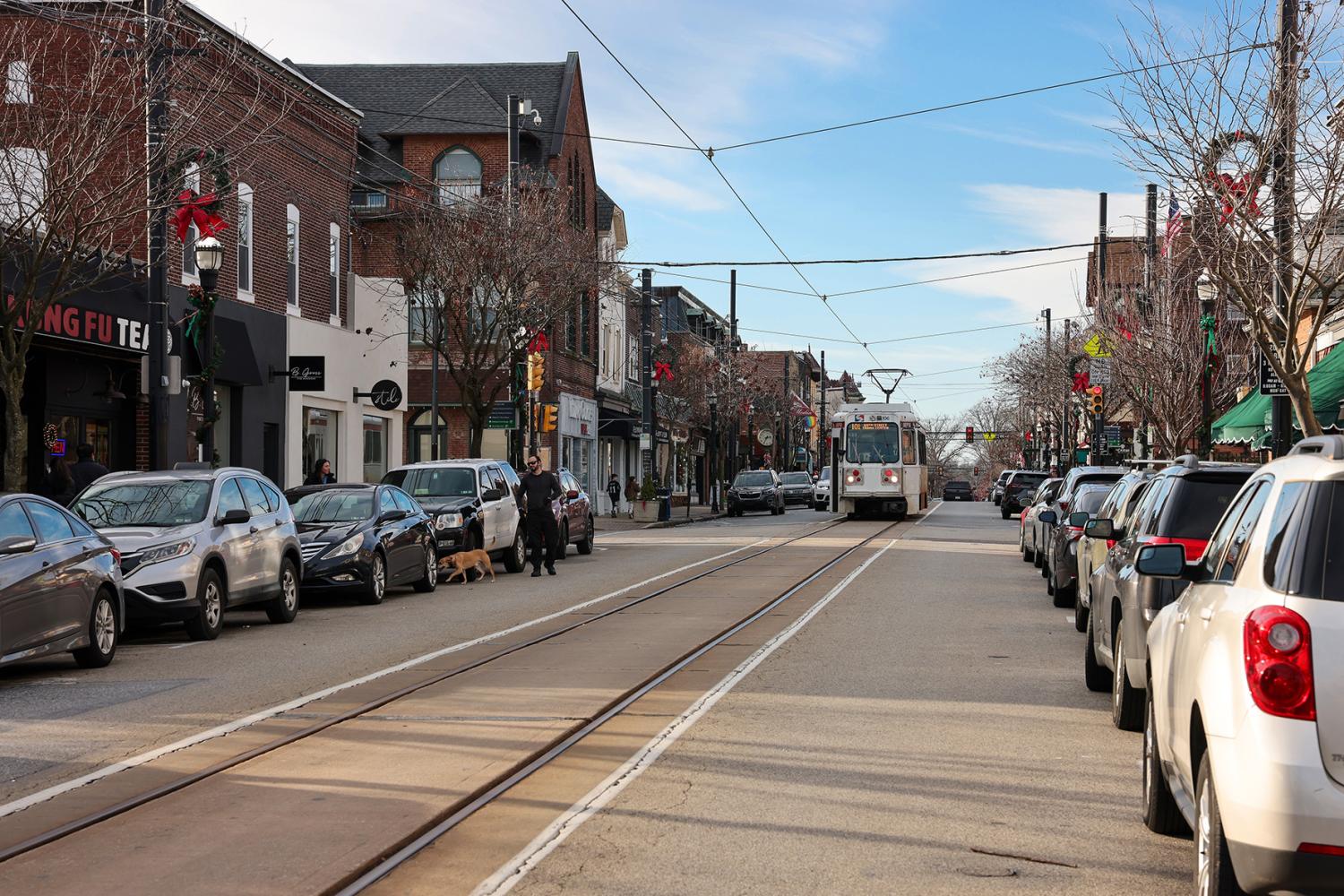Media, Pennsylvania, USA - Jan 1, 2023: A SEPTA tram is going through Media historic downtown on the first day of 2023