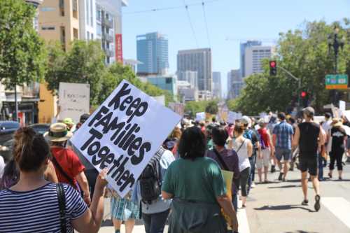 Protesters in San Francisco, California march from Dolores Park in the Mission District to City Hall to protest the Trump administration’s family separation and detention process on June 30, 2018.