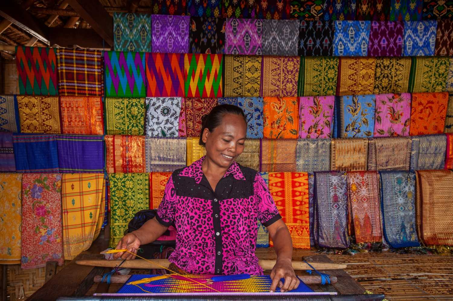 Tenun Ikat Songket, a traditional weaving process, in Sade Village on Lombok Island, Indonesia. (Misbachul Munir/Shutterstock)