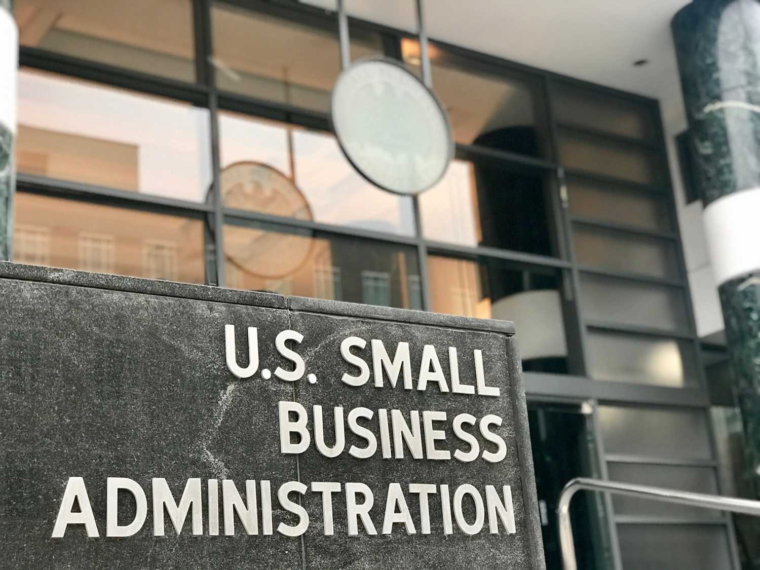 WASHINGTON, DC - JANUARY 12, 2019: SBA - SMALL BUSINESS ADMINISTRATION sign emblem seal at headquarters building entrance. SBA is the government agency that provides support to small businesses.