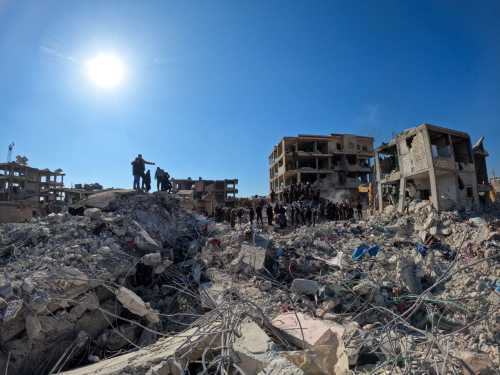 Rescue workers searching through the rubble of buildings in the rebel-held town of Jindayris on February 9, 2023, three days after a deadly earthquake that struck both Turkey and Syria.