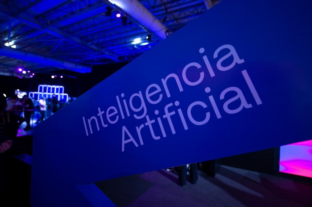 "Inteligencia Artificial" (Artificial Intelligence) is seen on a sign at the "IT Joven" technology fair in Buenos Aires, Argentina, in April 2023.