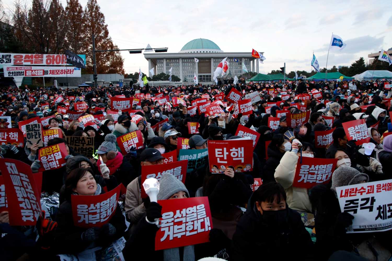 Citizens gather in Yeouido, South Korea, on December 7, 2024, to demand the impeachment and resignation of President Yoon Suk Yeol.