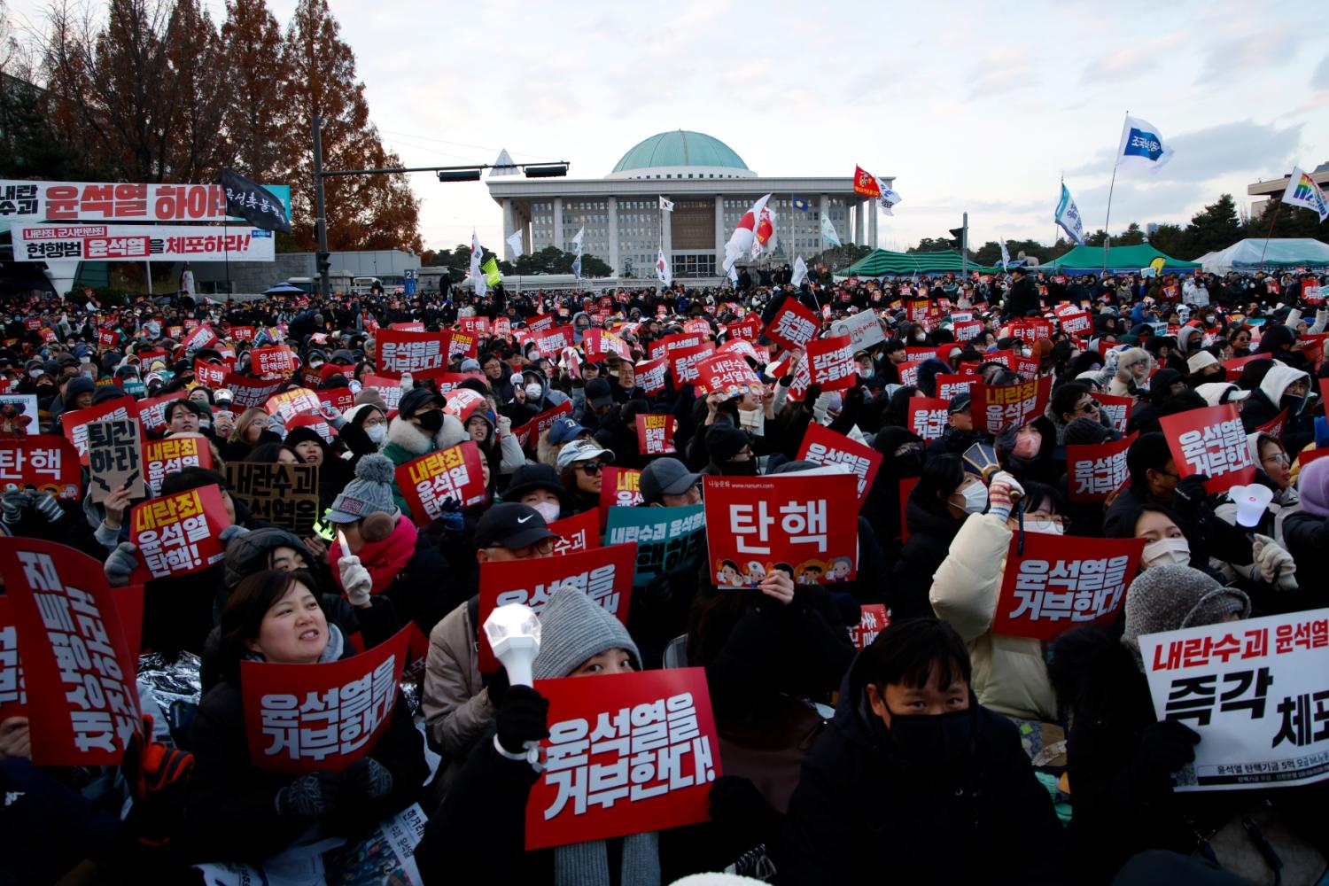 Citizens gather in Yeouido, South Korea, on December 7, 2024, to demand the impeachment and resignation of President Yoon Suk Yeol.