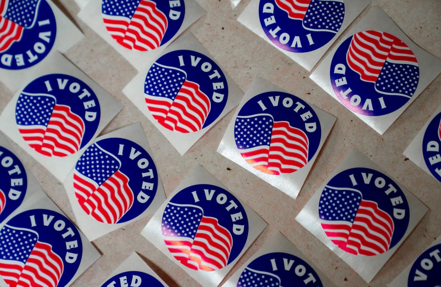 Stickers are lined on a table for voters at the American Legion Post 53 polling location during the Wisconsin Supreme Court election in Eau Claire, Wisconsin, U.S., April 1, 2025.