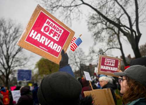 Demonstrators rally on Cambridge Common in a protest organized by the City of Cambridge calling on Harvard leadership to resist interference at the university by the federal government in Cambridge, Massachusetts, U.S. on April 12, 2025.