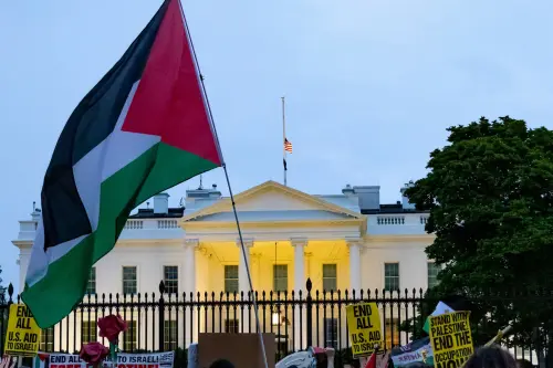 A Palestinian flag flies outside the White House during a demonstration on April 25, 2025 denouncing the ongoing genocide of Palestinians in Gaza.
